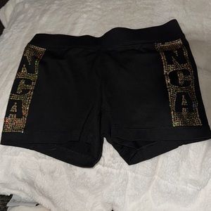 NCA SHORTS WITH GOLDEN SPARKLES